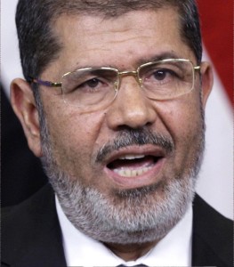 Fig. 97 - Il Presidente egiziano Moḥamed Morsi